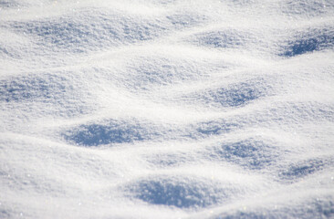 Fototapeta na wymiar many unevenness on the snow layer