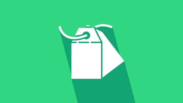 White Blank label template price tag icon isolated on green background. Empty shopping discount sticker. Template discount banner. 4K Video motion graphic animation.