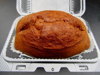 Banana bread in clear plastic container