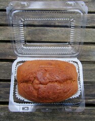 Banana loaf in clear plastic container