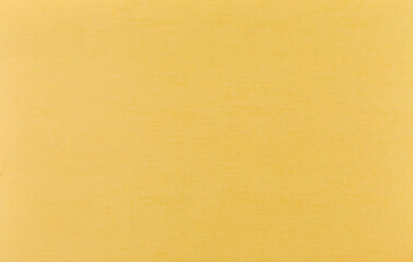 Texture yellow sheet of colored cardboard background for design.
