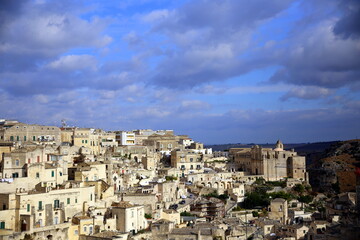 Fototapeta na wymiar Blue sky over houses and churches in the Sassi of Matera, European Capital of Culture 2019
