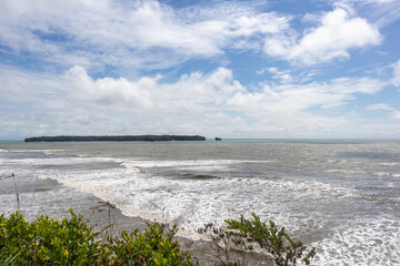 Image of the beaches and the Pacific Ocean in Bahía Málaga, Buenaventura, Valle del Cauca, Colombia. Blue sky.