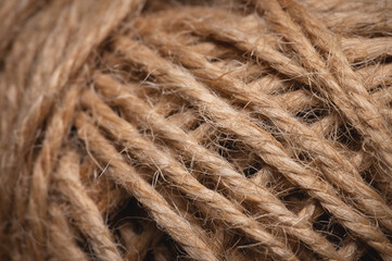Natural jute twine macro photography. Jute thread texture. A coil of jute rope.