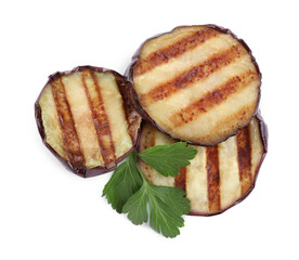 Delicious grilled eggplant slices and parsley on white background, top view
