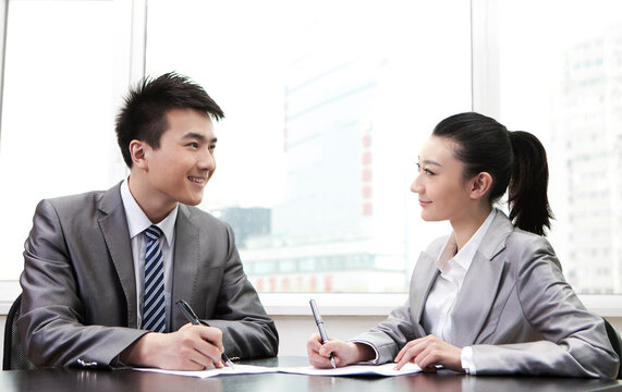 Businessman and businesswoman in a business meeting,portrait