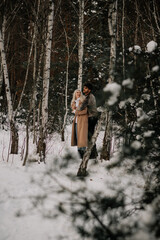  couple in winter forest