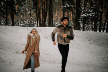 couple walking in the woods