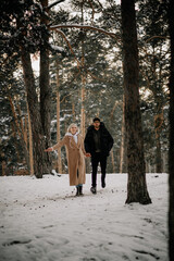 couple walking in the woods