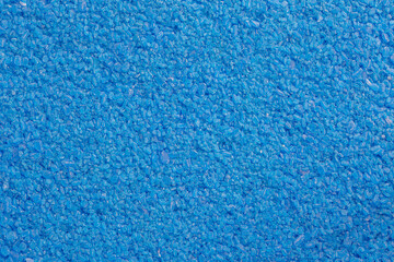 Fototapeta na wymiar full frame background and texture of blue copper sulfate granules - close-up