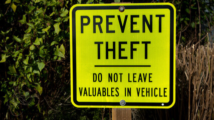Yellow metal prevent theft sign - 407505914
