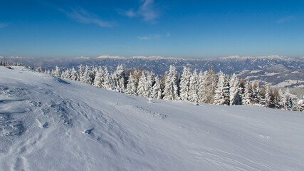 Fototapeta na wymiar Beautiful winter landscape with blue sky in Austria