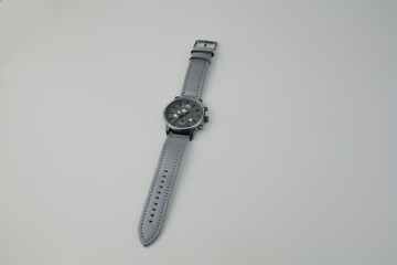 grey watch on gray background