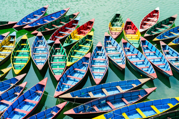 Colorful wooden boats in Phewa Lake, Pokhara, Nepal