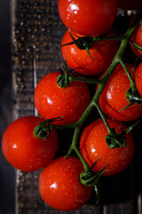 cherry tomatoes on a branch