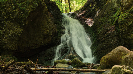 Majestic Lrálický waterfall near the village Tajov.
