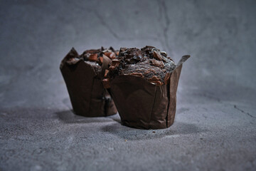 chocolate muffins on a dark background