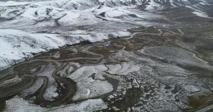Aerial photography of the natural scenery of the wetland after the snow. Zoige, Ngawa Tibetan and Qiang Autonomous Prefecture, Sichuan, China