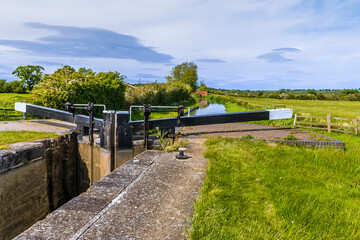 A view from Adkins Lock down the Oxford Canal near to the village of Napton, Warwickshire in summertime