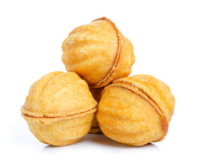 Nuts with condensed milk on white background isolation
