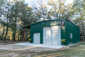 Large green outdoor metal building