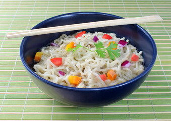 Pasta with vegetables in bowl
