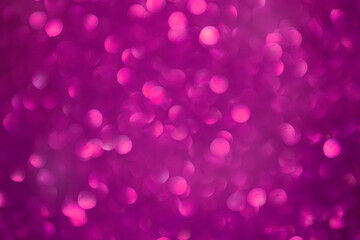 Purple bokeh blurred background. Purple festive background with glitter for romance, love and Valentine's day concepts.