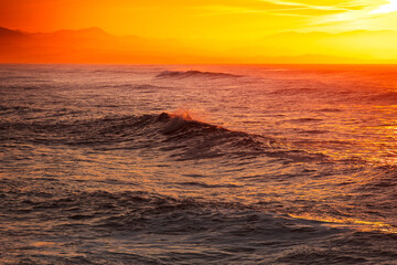 Naklejka premium Huge waves on the city of Biarritz at the Basque Country's coast.