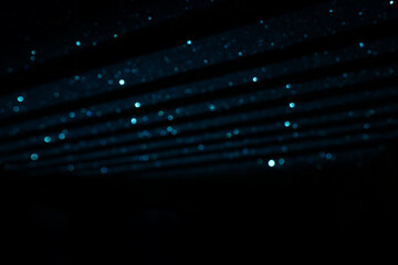 background of abstract gold and black glitter lights. defocused