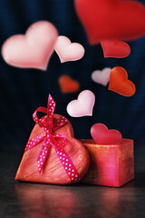 Valentine’s hearts are fly out of open heart-shaped gift box