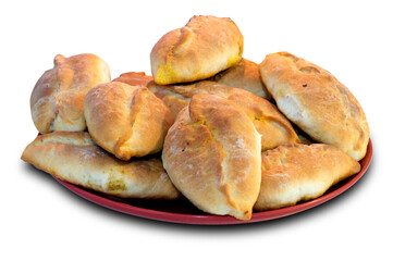 pies in a red plate