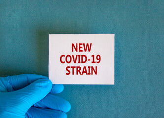 British new fast-moving strain covid-19 symbol. Hand in blue glove with white card. Concept words...