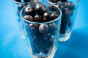 Fresh blueberries in a glass vase