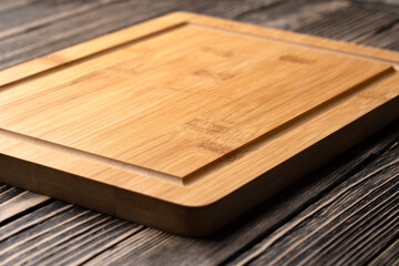 wooden cutting board not brown wooden table