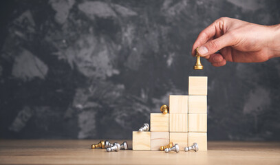 man hand chess on blocks