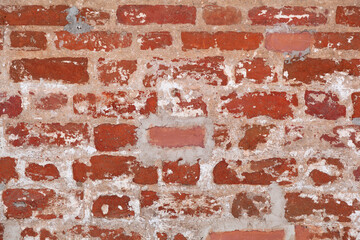 Background of a brick wall. Natural old masonry bricks - 407530751