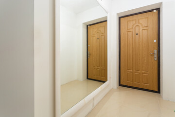 door in modern entrance hall of corridor in expensive apartments