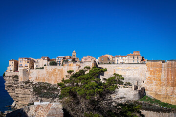 Fototapeta na wymiar Old Town of bonifacio, dramatically siutated atop an eroding limestone promontory. Corsica, France