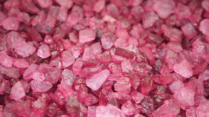 Salt crystals, lilac color, close-up, macro photo. Textured background made of natural materials.