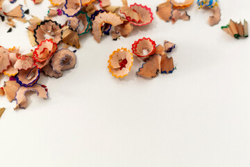 Colored graphite wooden pencil sharpener on white background.