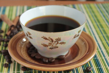cup of coffee on wooden table. mornings mood