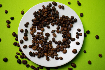 coffee beans on white plate
