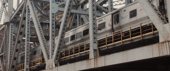 train passing by in a bridge in new york