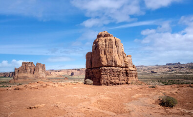 Dazzling Arches National Park in the summertime with sandstone formations on a partly cloudy day in Utah