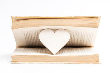 open book with heart symbol inside. love reading concept. valentine day greeting card conceptual