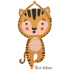 Children's cartoon illustration of a cute little joyful tiger cub in yoga asana Vrikshasana tree pose and handwritten "Be in balance" lettering on white background. Sporty ginger cat. Vector.
