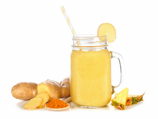 Naklejka na ściany i meble Turmeric, ginger and pineapple smoothie in a mason jar with ingredients isolated on a white background. Healthy immune boosting, weight loss, anti-inflammatory.