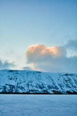 Fototapeta na wymiar dawn over the hills in winter in the north