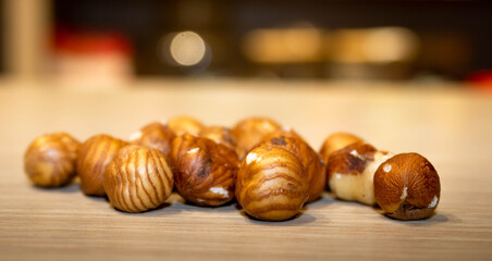Close up of hazelnuts on a table 