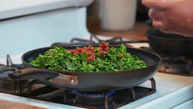 Food - Socca - Pouring Chopped Figs over Chard.